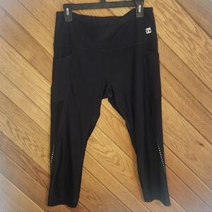 Hind large black cropped leggings with 3 pockets, mesh, and polka dot design